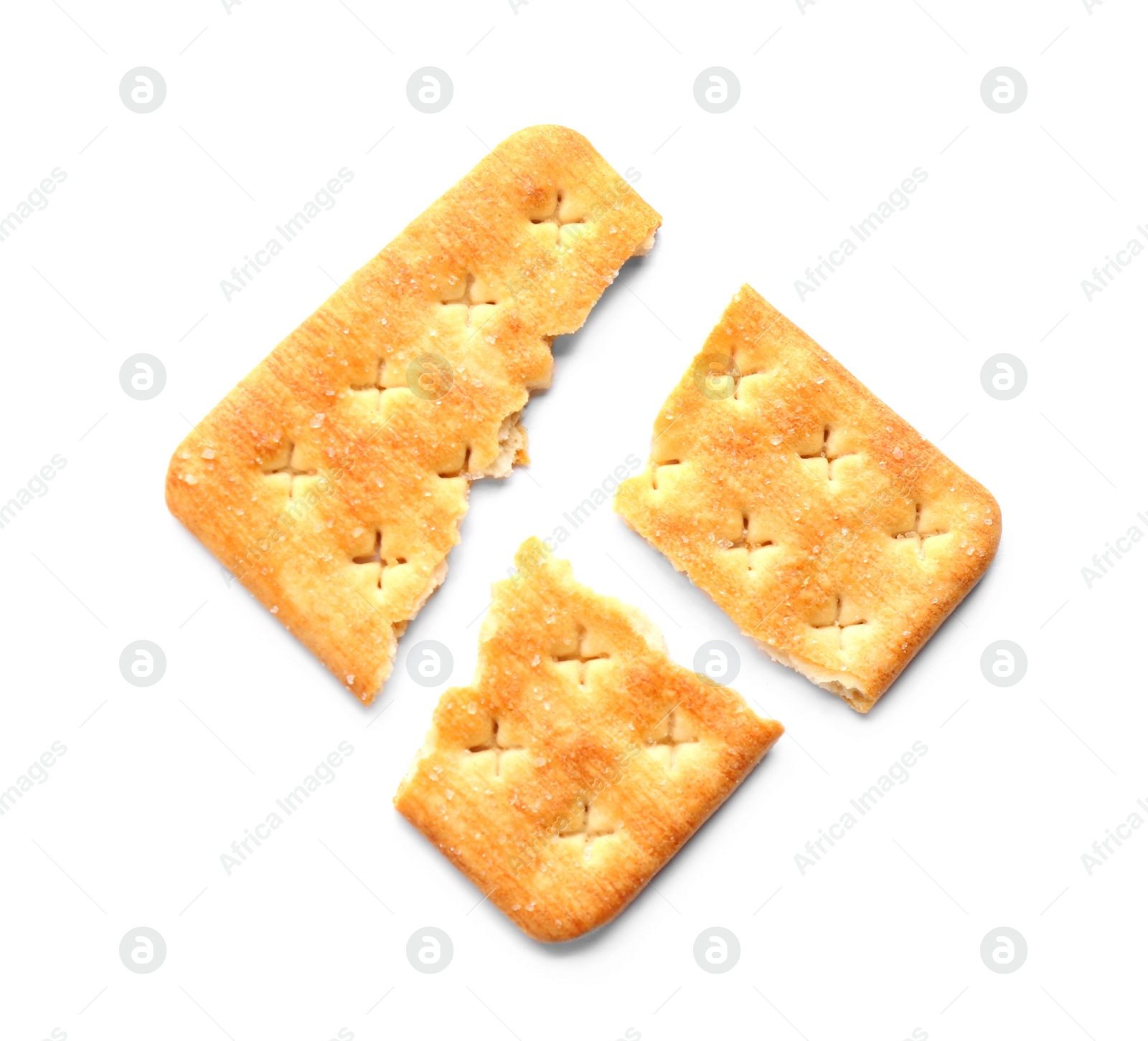 Photo of Broken delicious crispy cracker isolated on white, top view