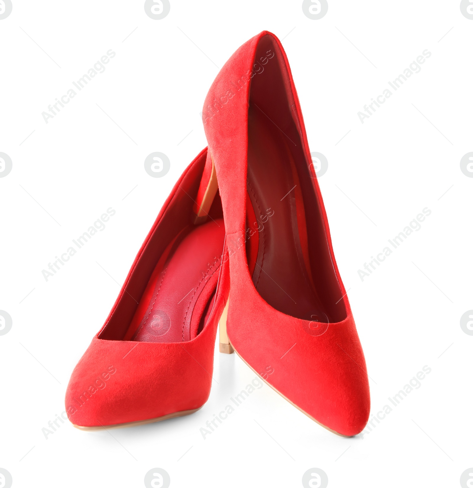 Photo of Pair of red female shoes on white background