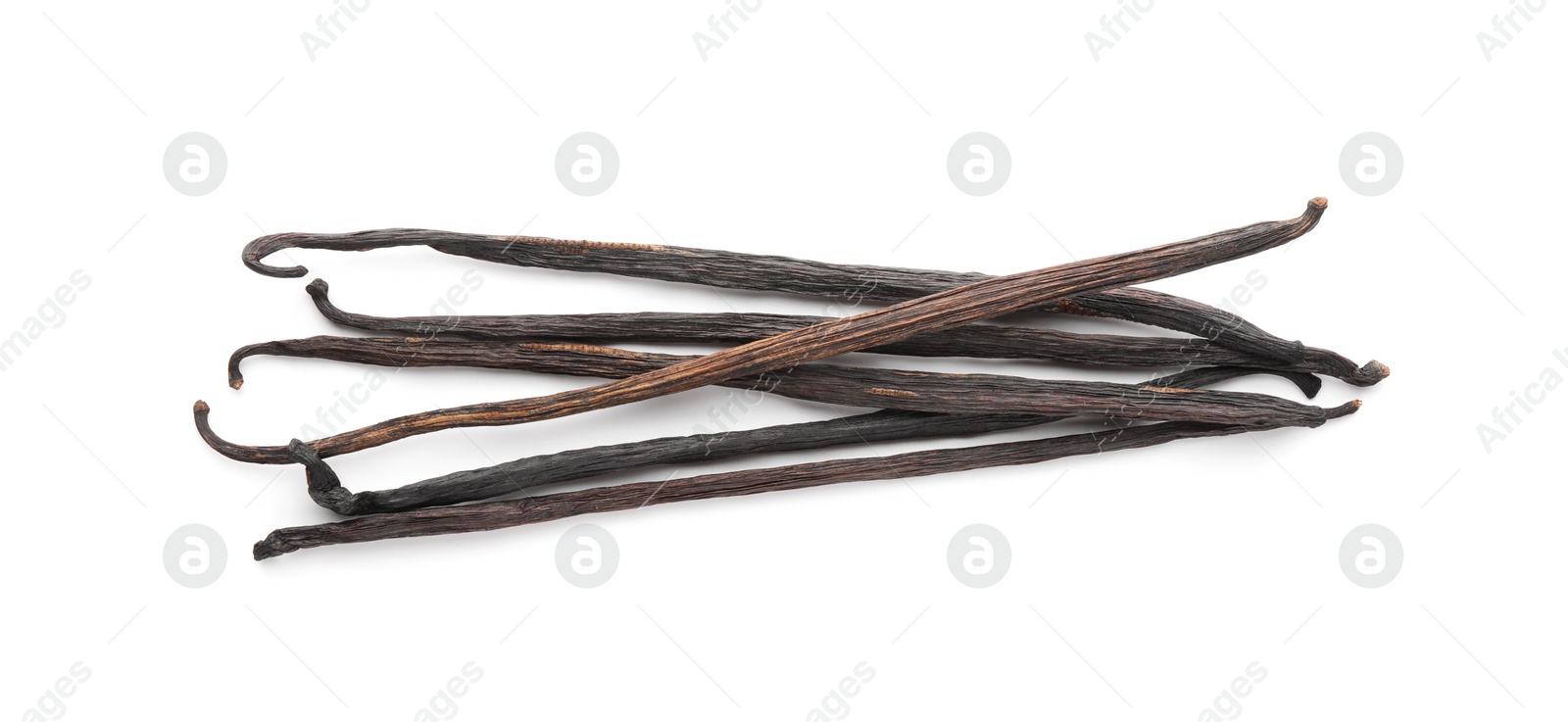 Photo of Many aromatic vanilla pods isolated on white, top view