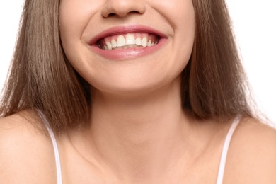 Photo of Young woman with beautiful smile, closeup. Teeth whitening