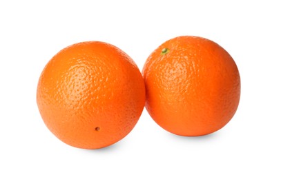 Photo of Delicious fresh ripe oranges on white background