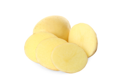 Photo of Whole and cut fresh raw organic potatoes on white background