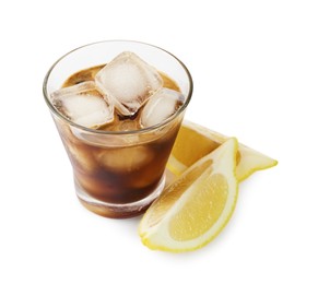 Photo of Iced coffee in glass and cut lemon isolated on white