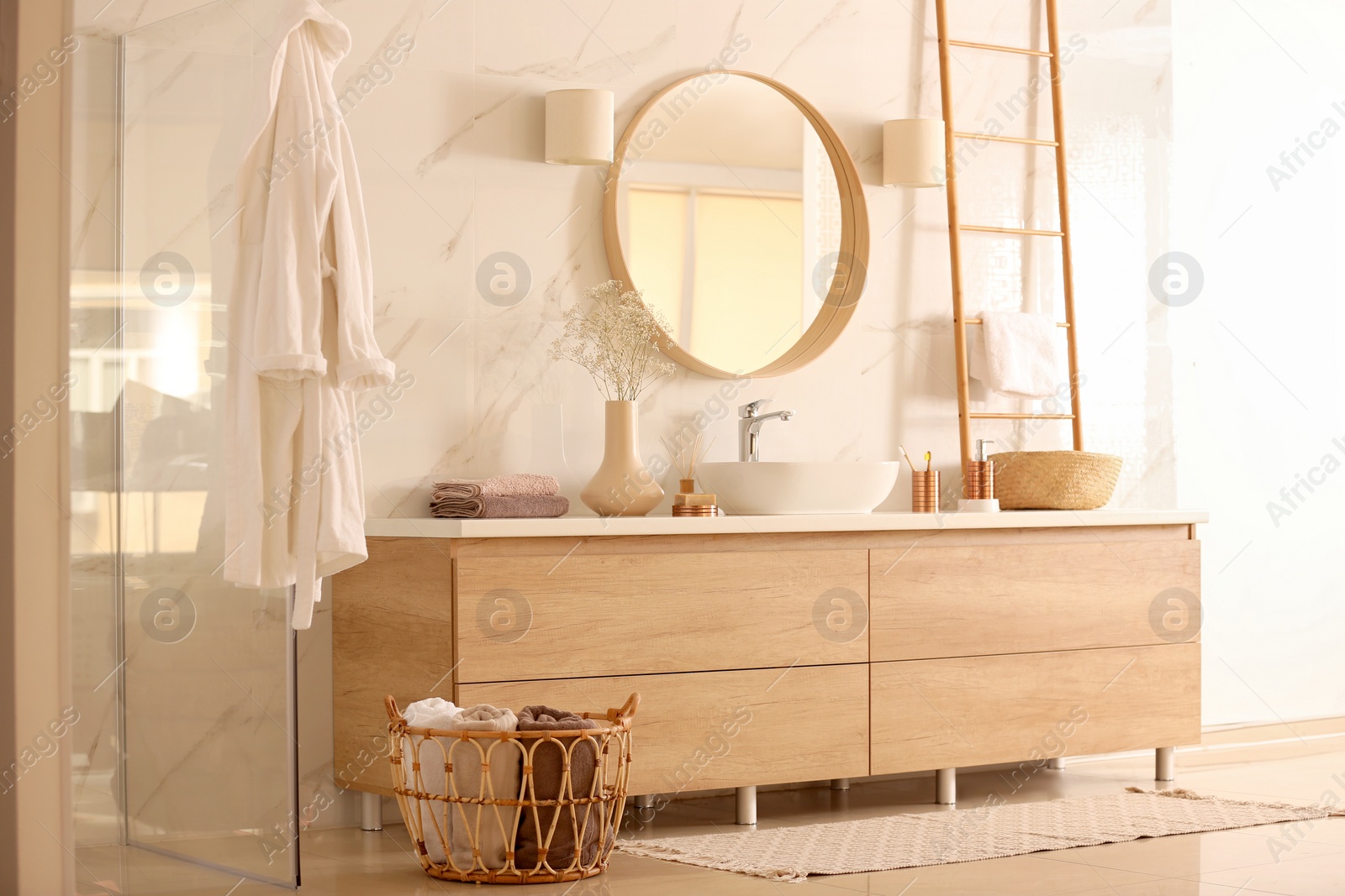 Photo of Modern bathroom interior with stylish mirror and vessel sink