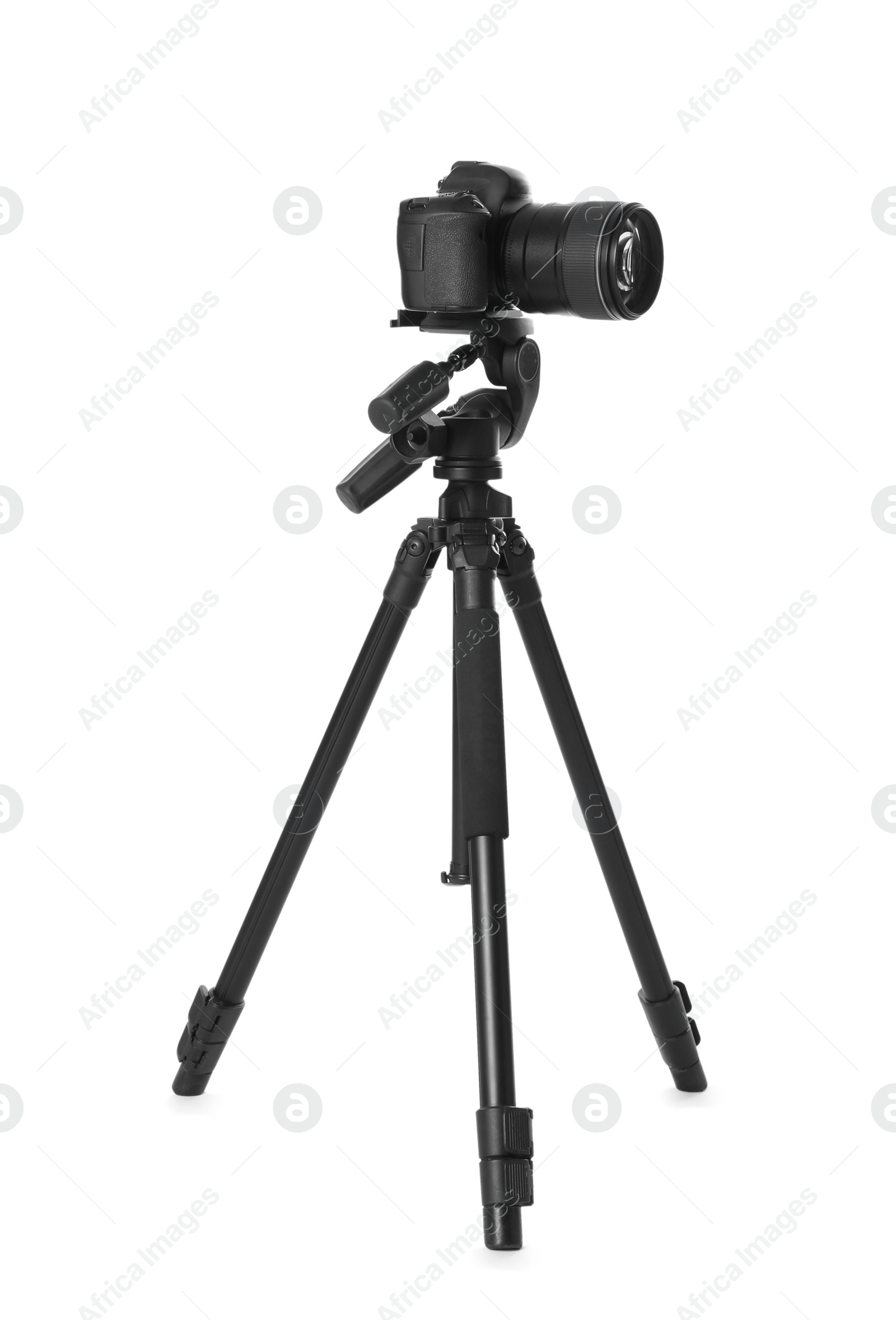 Photo of Modern tripod with camera isolated on white