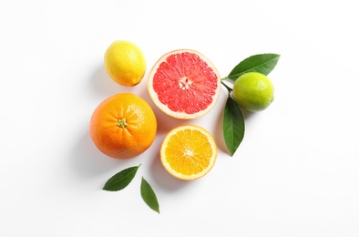 Photo of Flat lay composition with different citrus fruits on white background