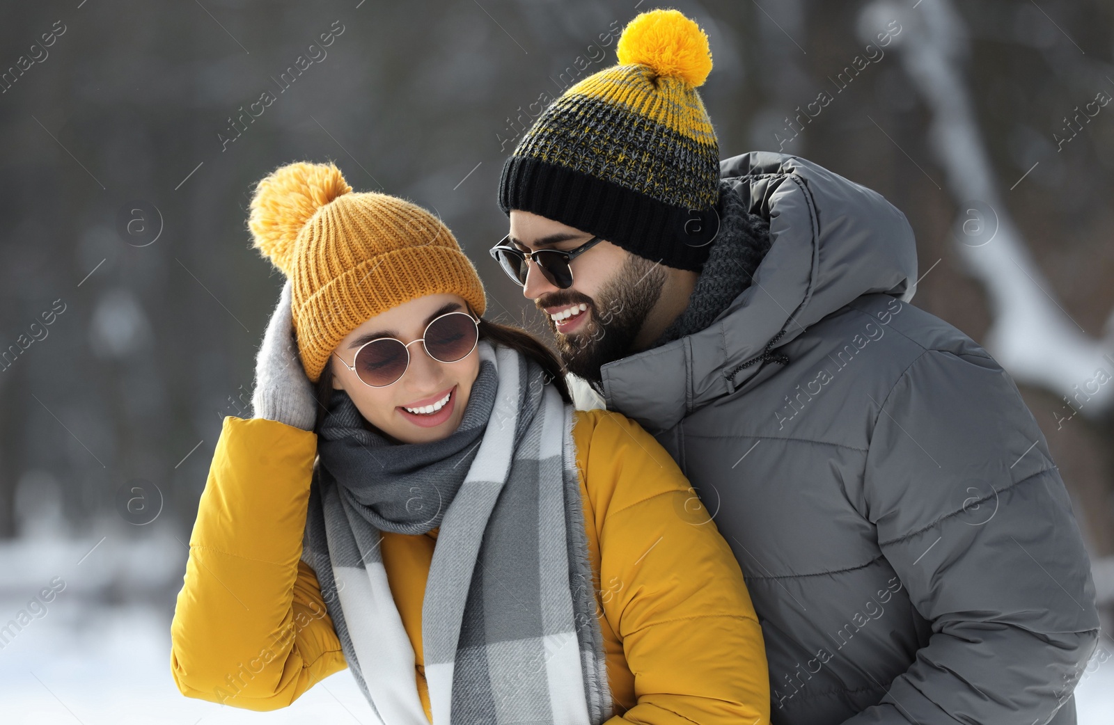 Photo of Beautiful happy couple outdoors on winter day