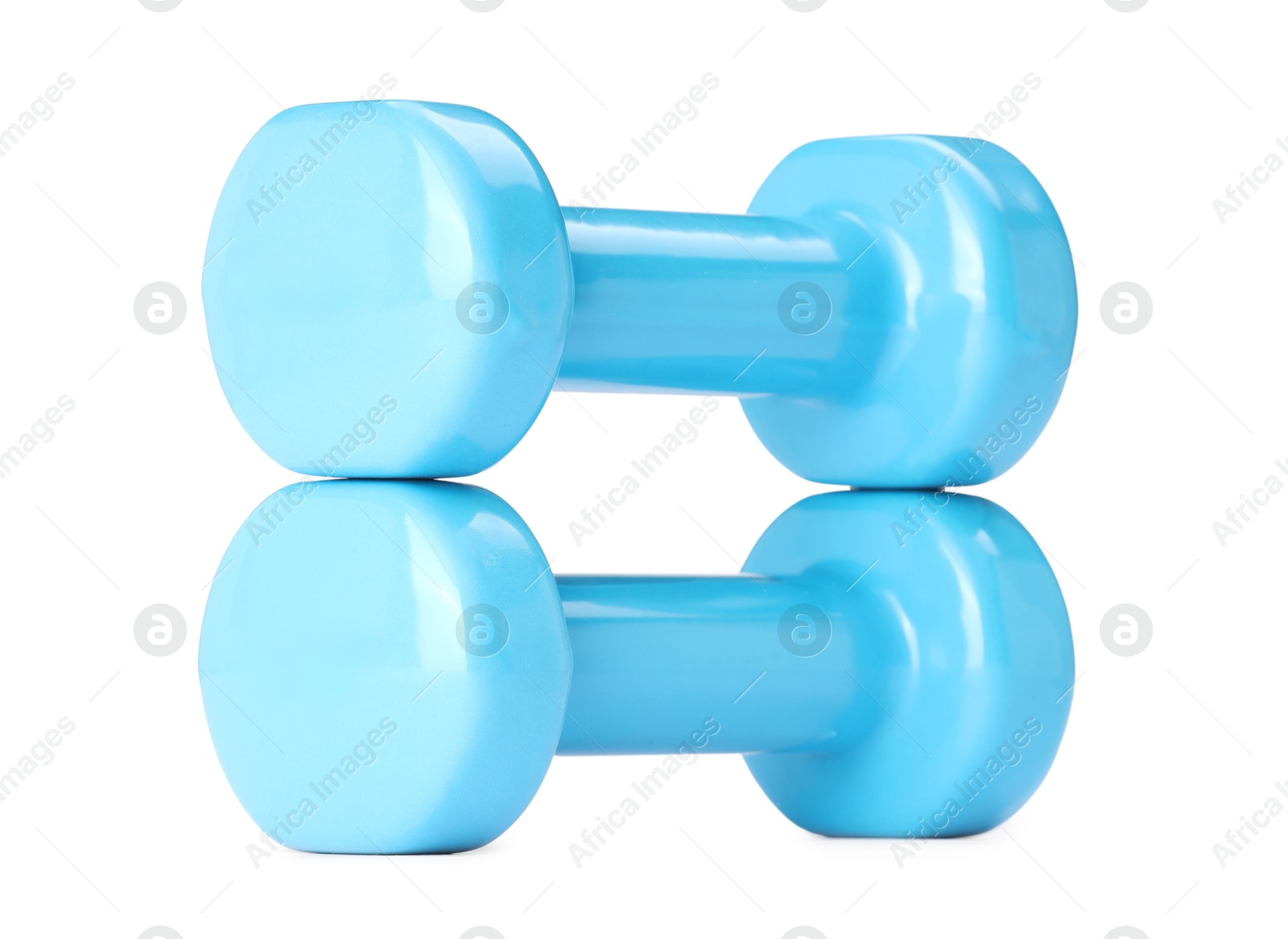 Photo of Light blue dumbbells isolated on white. Sports equipment