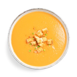 Photo of Tasty creamy pumpkin soup with croutons in bowl on white background, top view