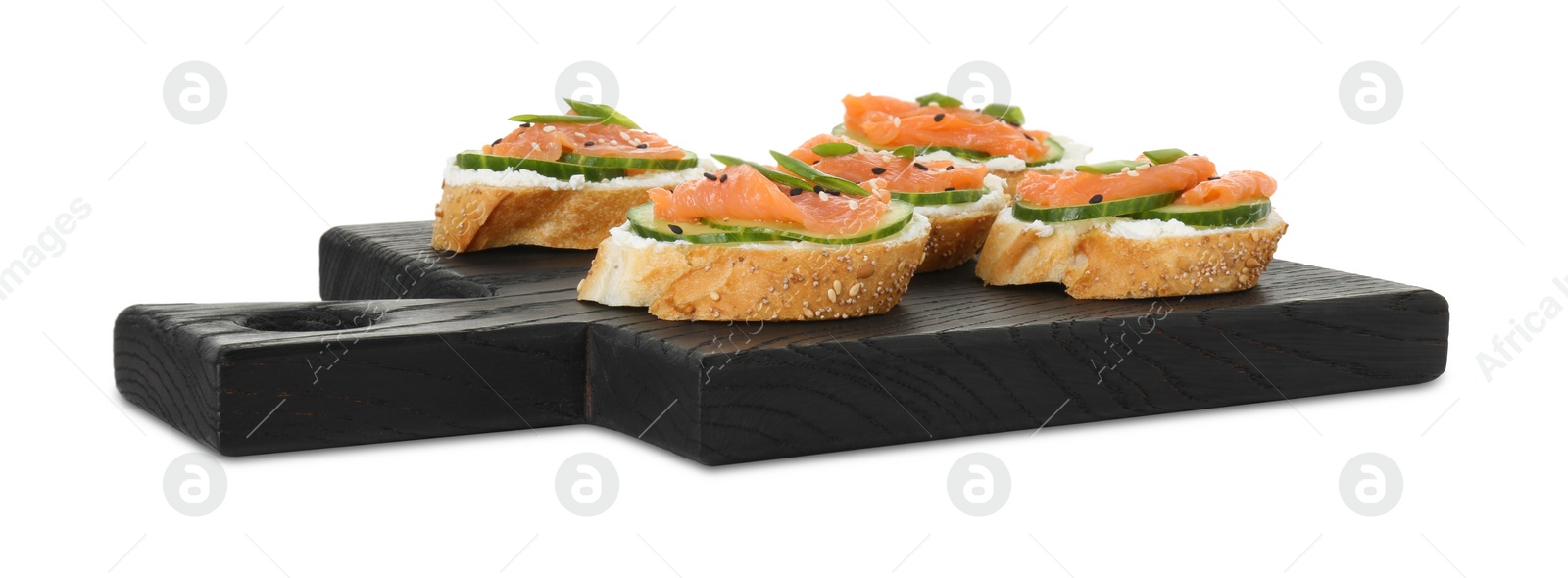Photo of Tasty canapes with salmon, cucumber and cream cheese isolated on white