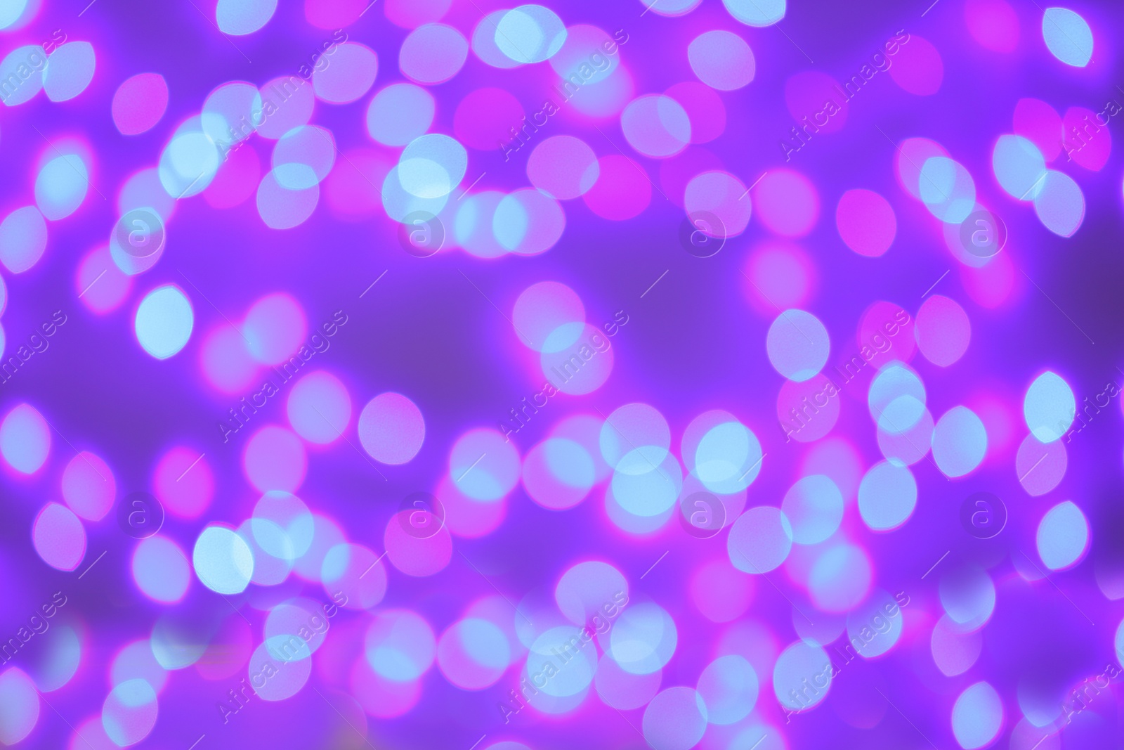 Photo of Beautiful glowing lights as background. Bokeh effect