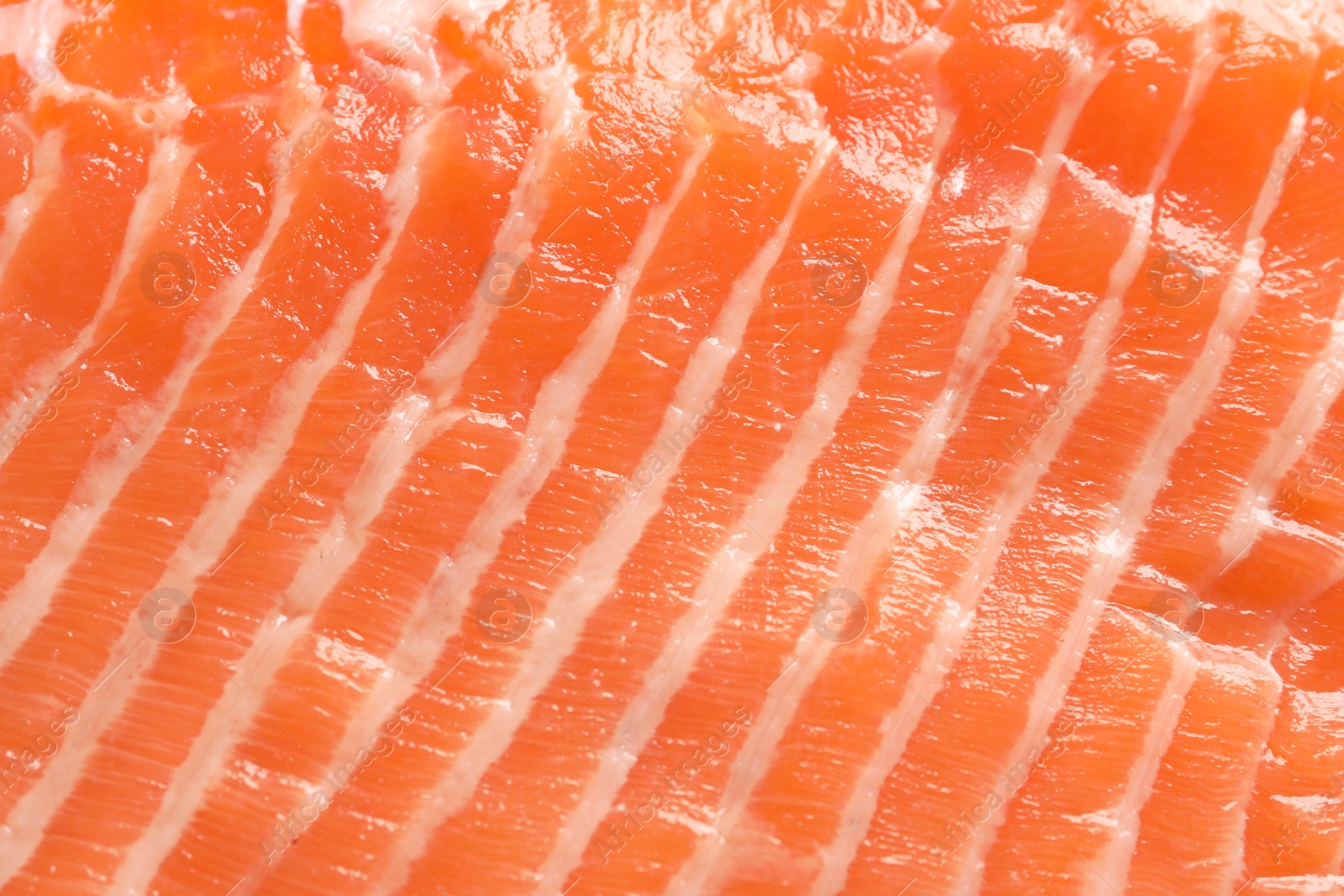 Photo of Raw salmon fillet as background, closeup