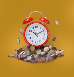 Image of Time is money. Alarm clock on pile of coins against yellow background