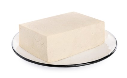 Photo of Plate with delicious raw tofu isolated on white