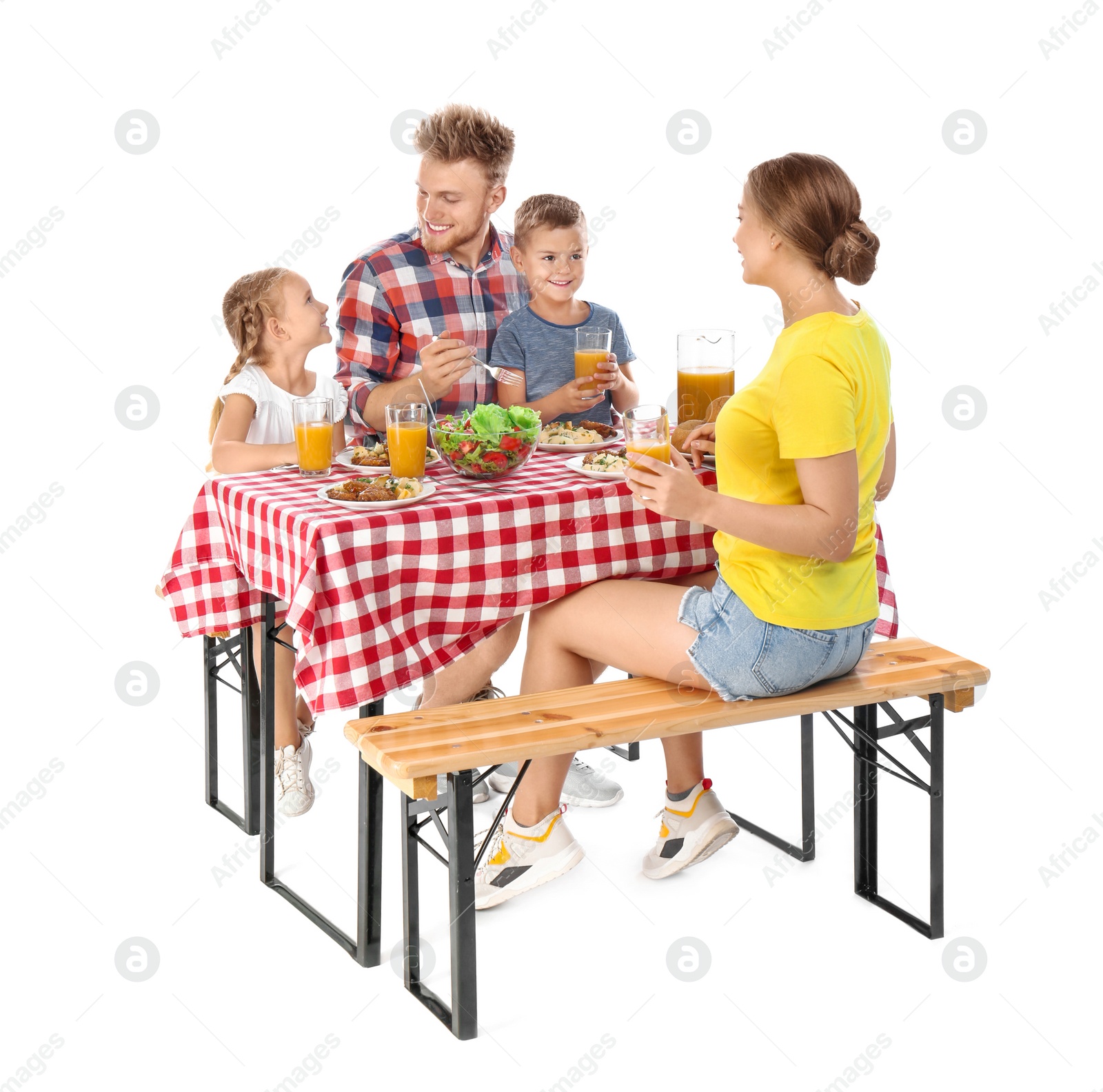 Photo of Happy family having picnic at table on white background