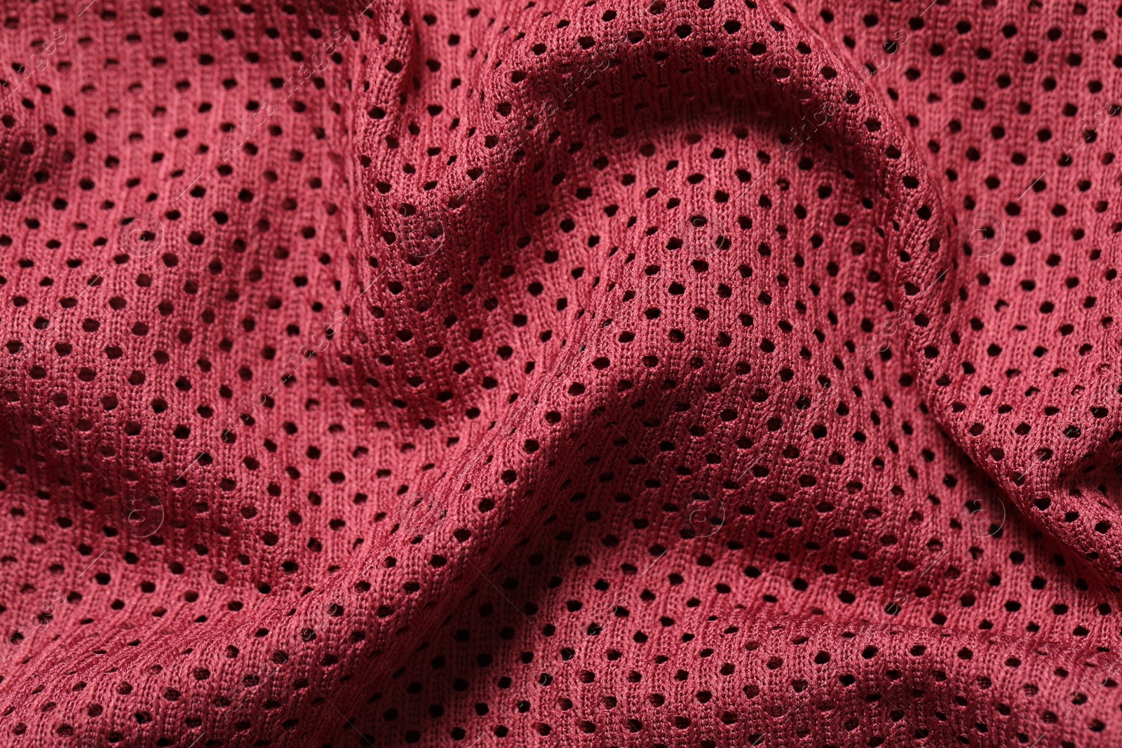 Photo of Texture of burgundy fabric as background, closeup