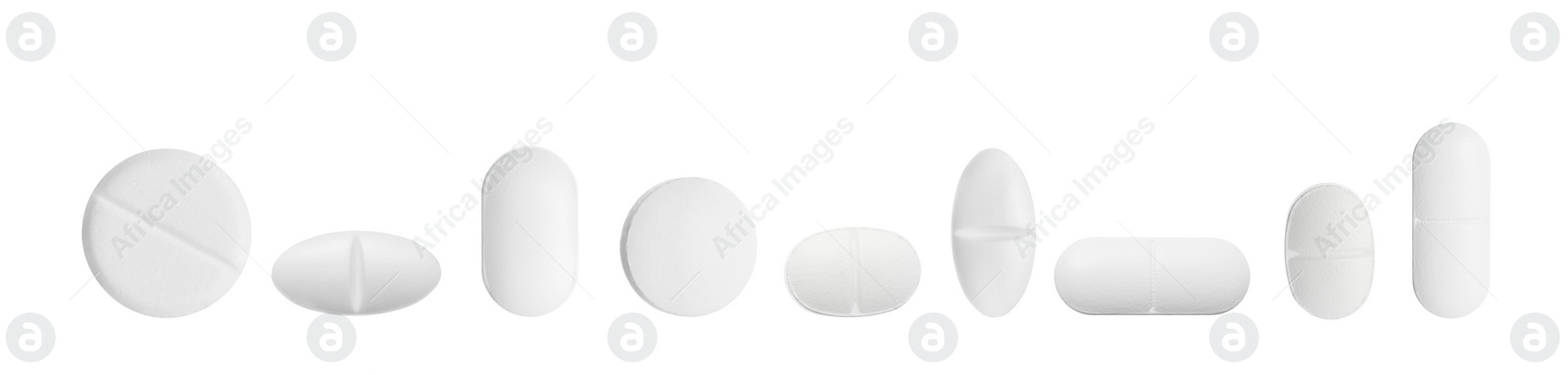 Image of Set of different pills in row isolated on white