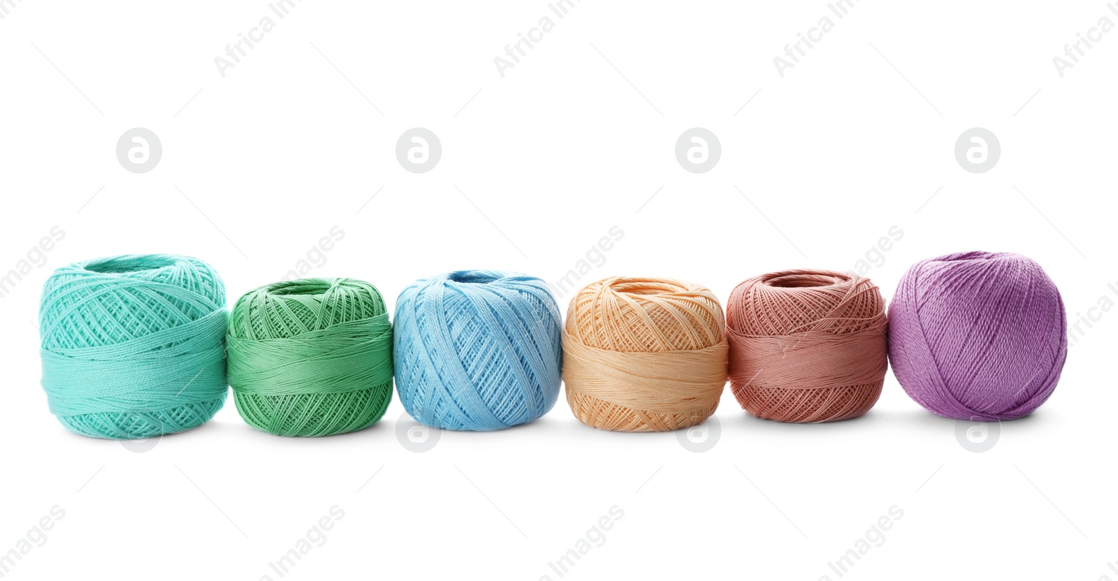 Photo of Color threads on white background