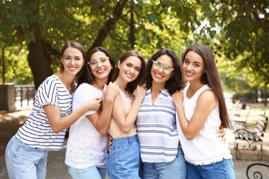 Happy women outdoors on sunny day. Girl power concept