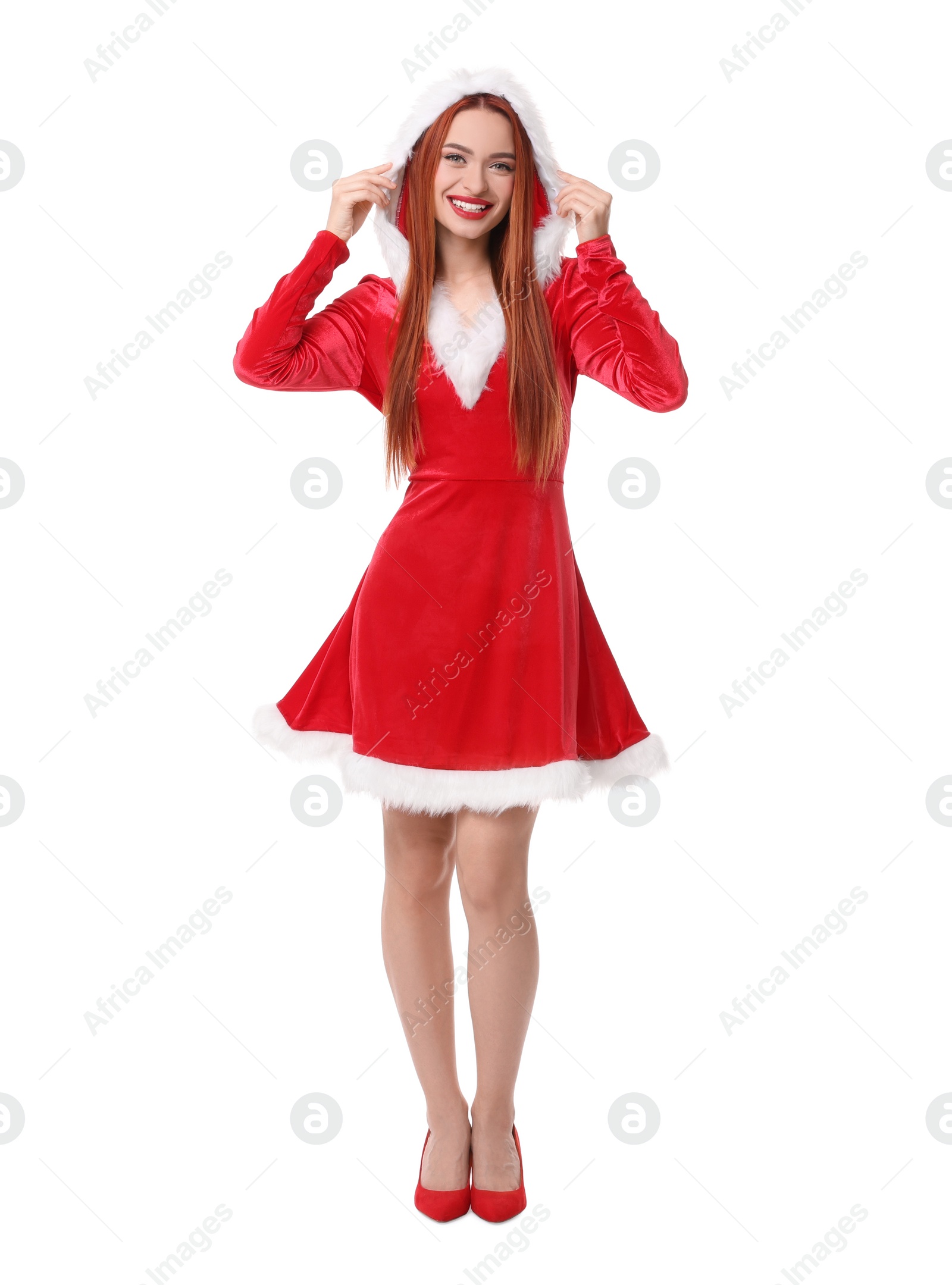 Photo of Young woman in red dress on white background. Christmas celebration