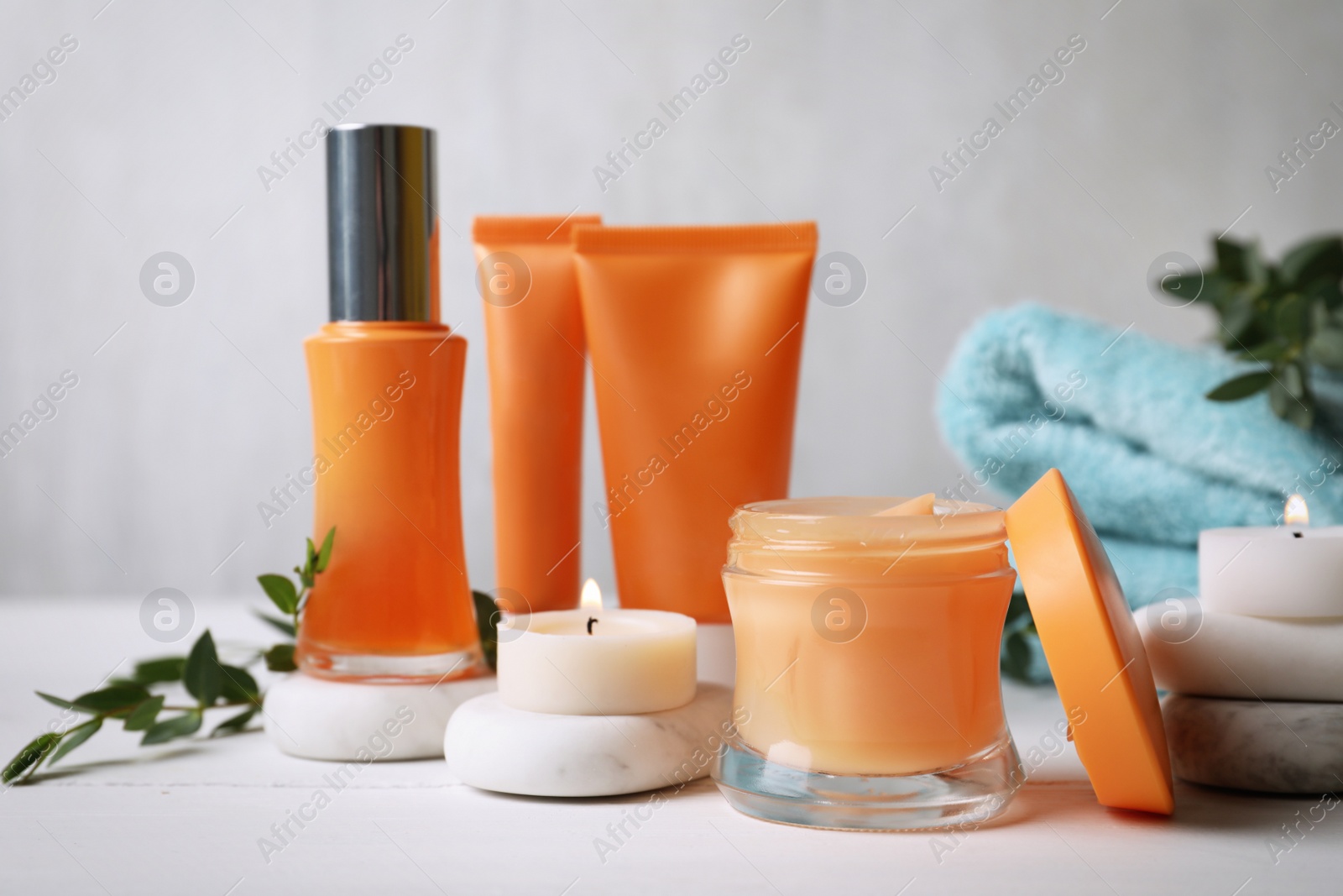 Photo of Composition with cosmetic products on white table