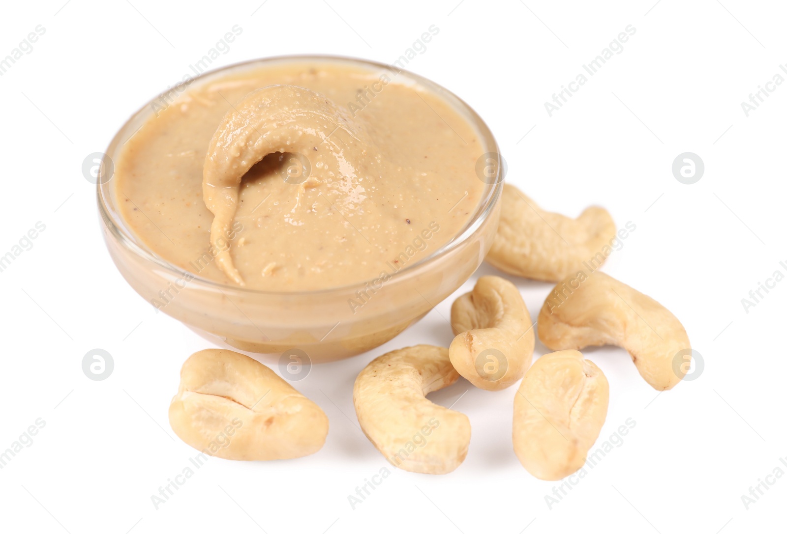 Photo of Delicious nut butter and cashews isolated on white