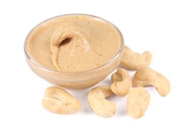 Photo of Delicious nut butter and cashews isolated on white