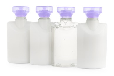 Photo of Mini bottlescosmetic products isolated on white