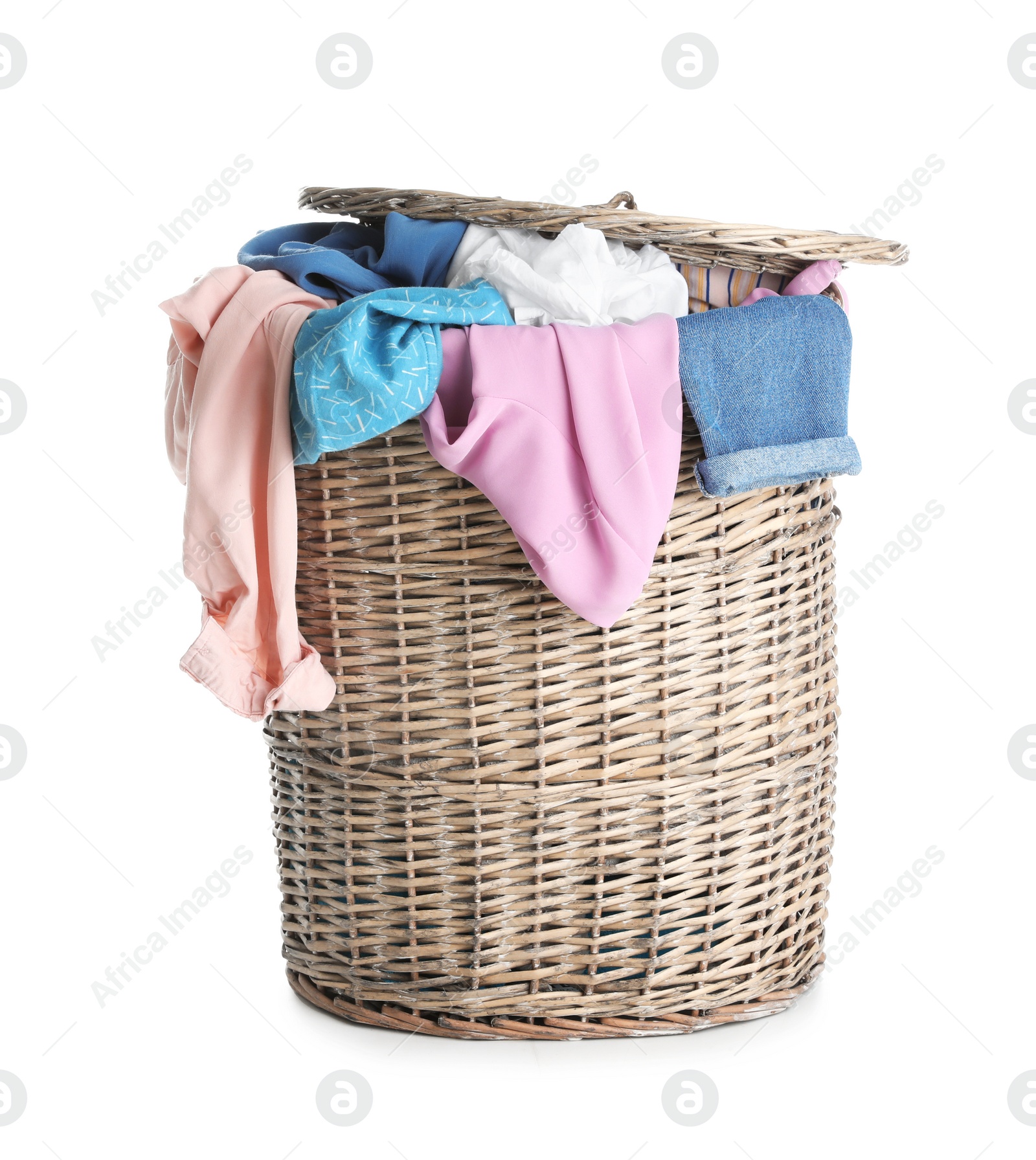 Photo of Wicker basket full of dirty laundry isolated on white