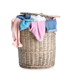 Photo of Wicker basket full of dirty laundry isolated on white