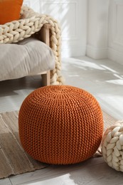 Stylish comfortable poufs in room. Home design