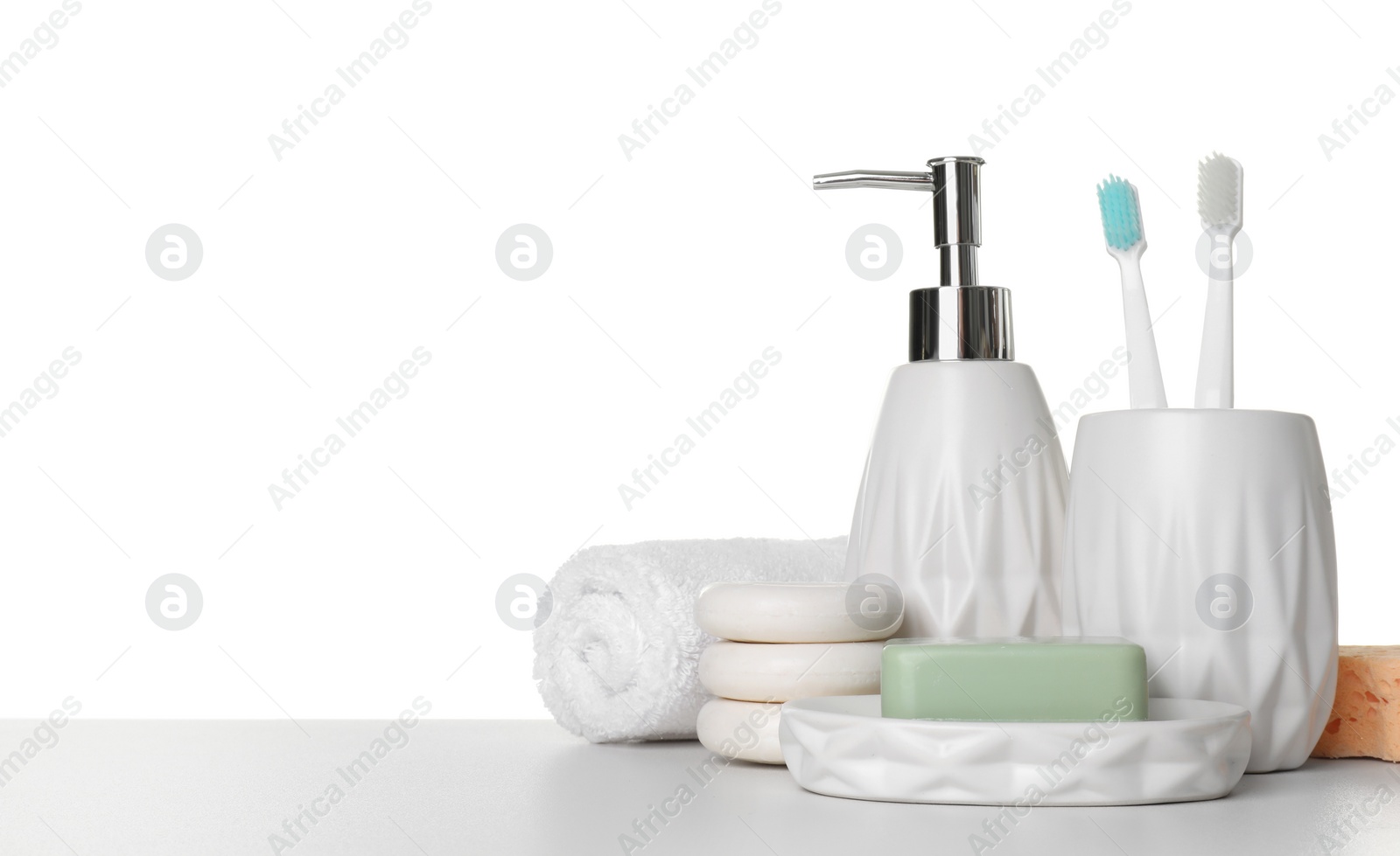 Photo of Bath accessories. Different personal care products on table against white background. Space for text