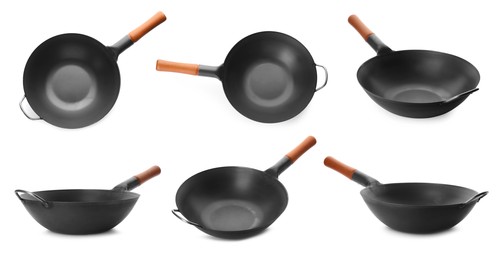 Image of Set with empty woks on white background