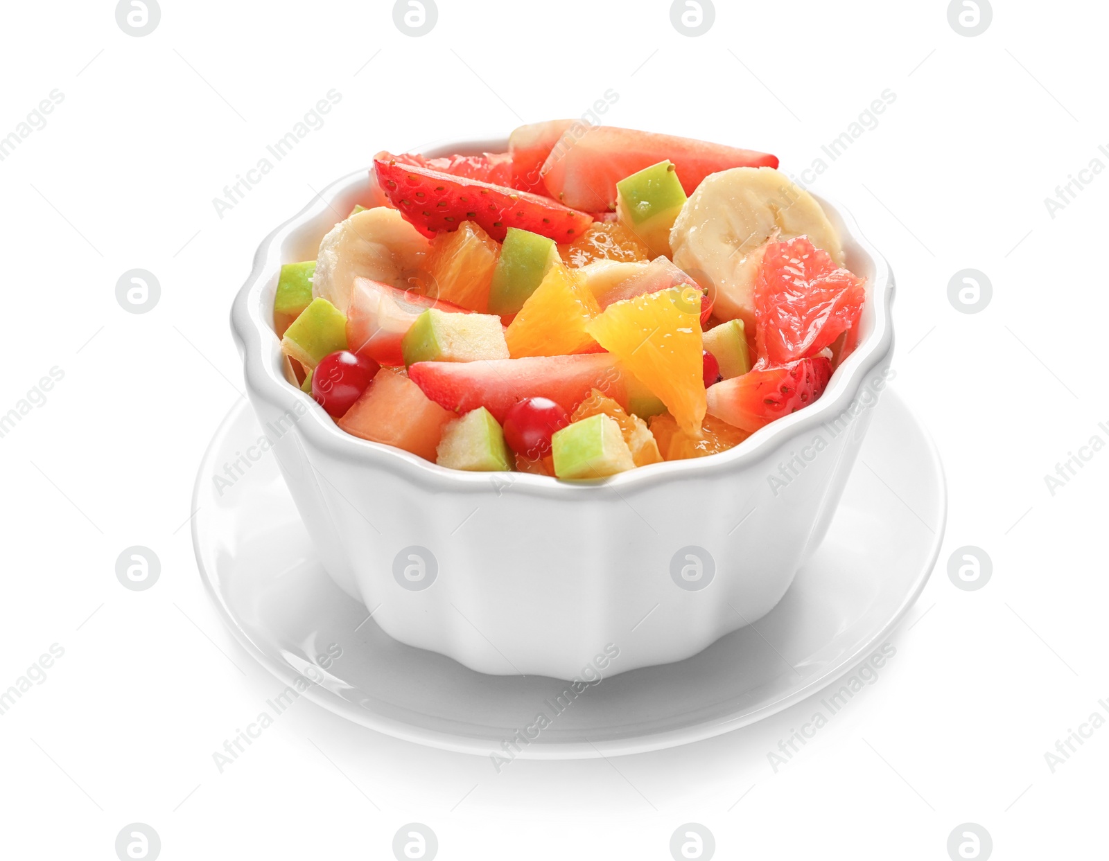 Photo of Bowl with fresh cut fruits on white background