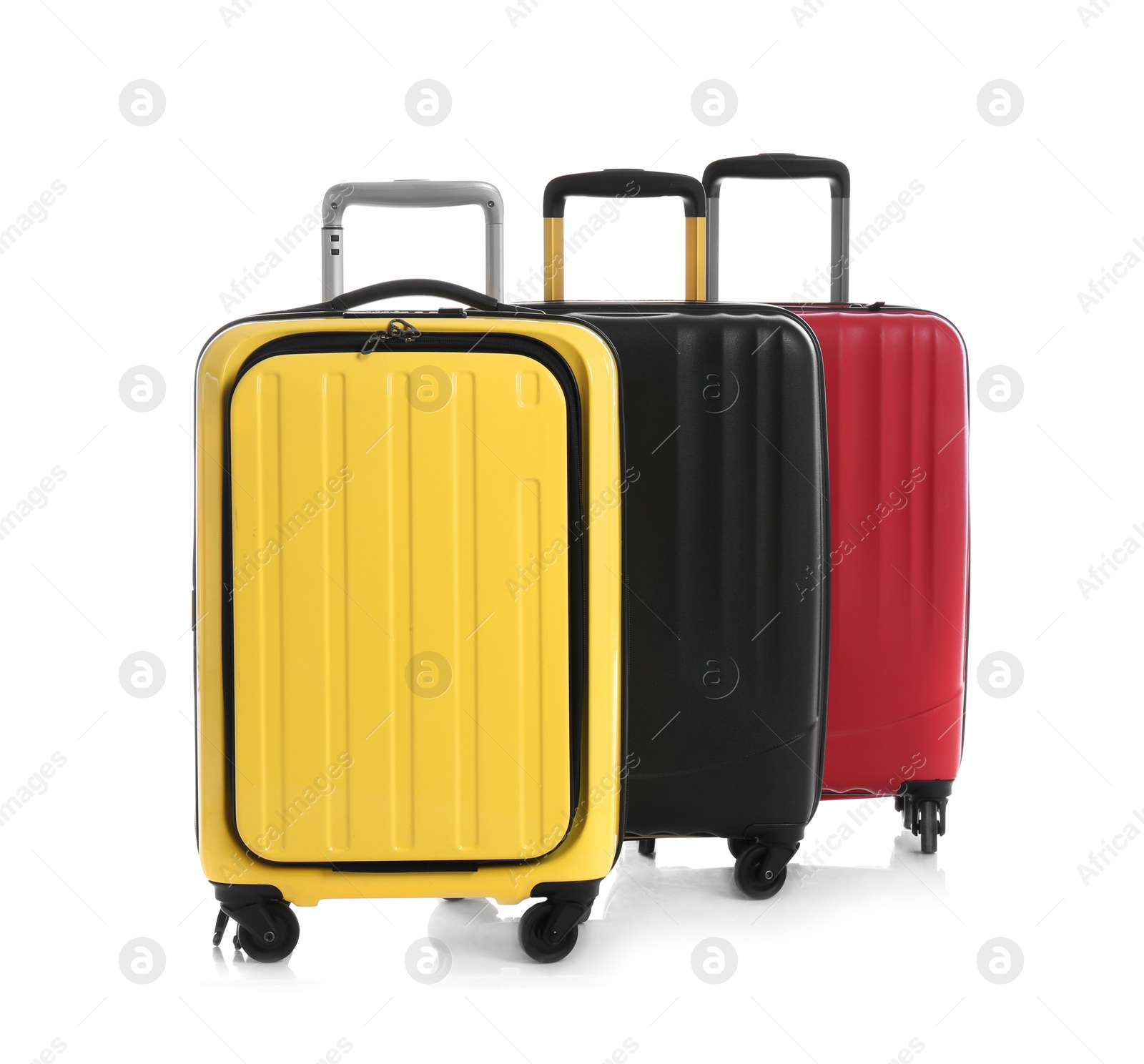 Photo of Modern suitcases for travelling on white background