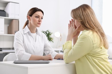 Photo of Mammologist's appointment. Doctor and woman in hospital