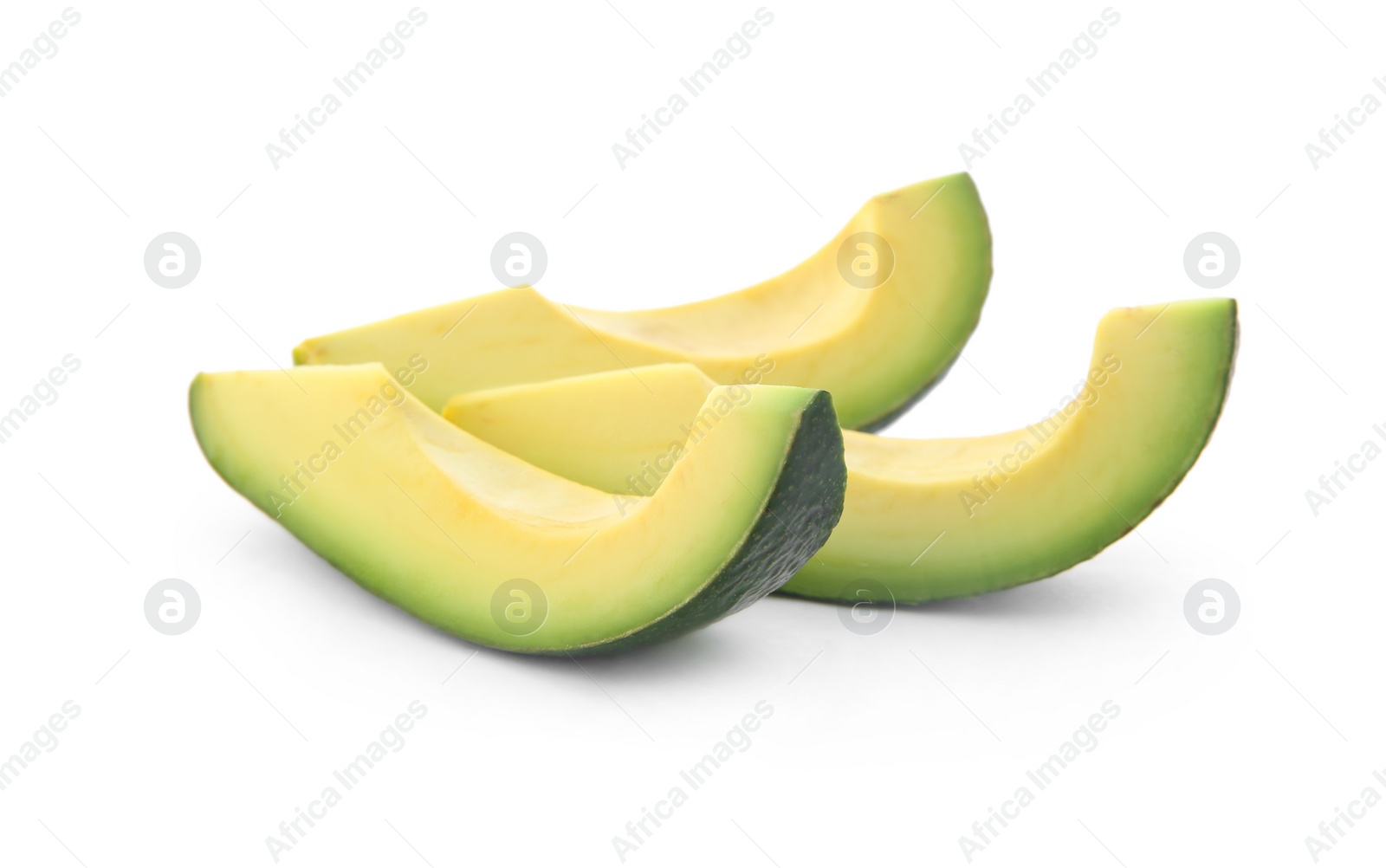 Photo of Slices of ripe avocado on white background