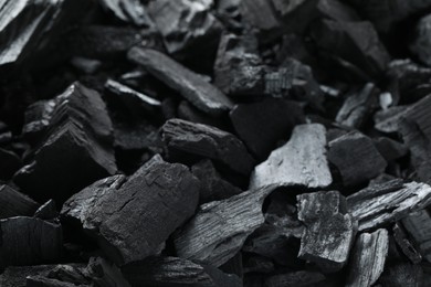 Photo of Heap of coal as background, closeup view