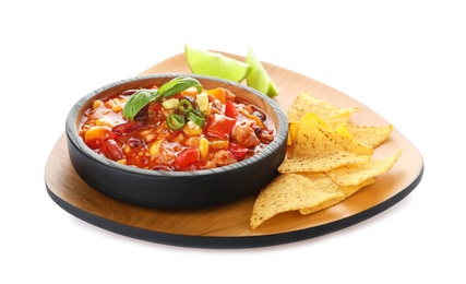 Plate with chili con carne and nachos on white background