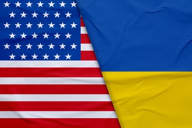 Image of Flags of Ukraine and USA. International diplomatic relationships