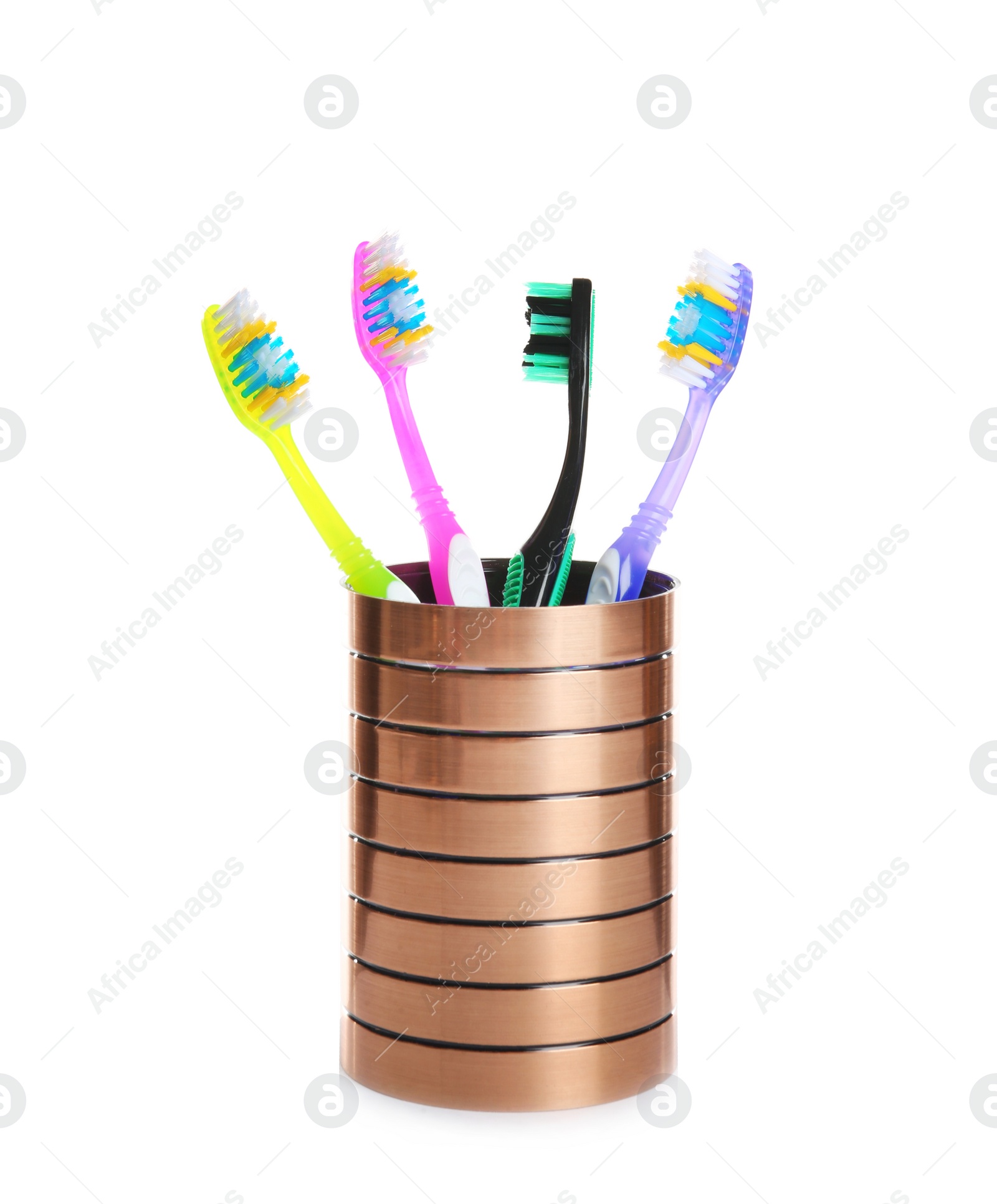 Photo of Cup with different toothbrushes on white background. Dental care