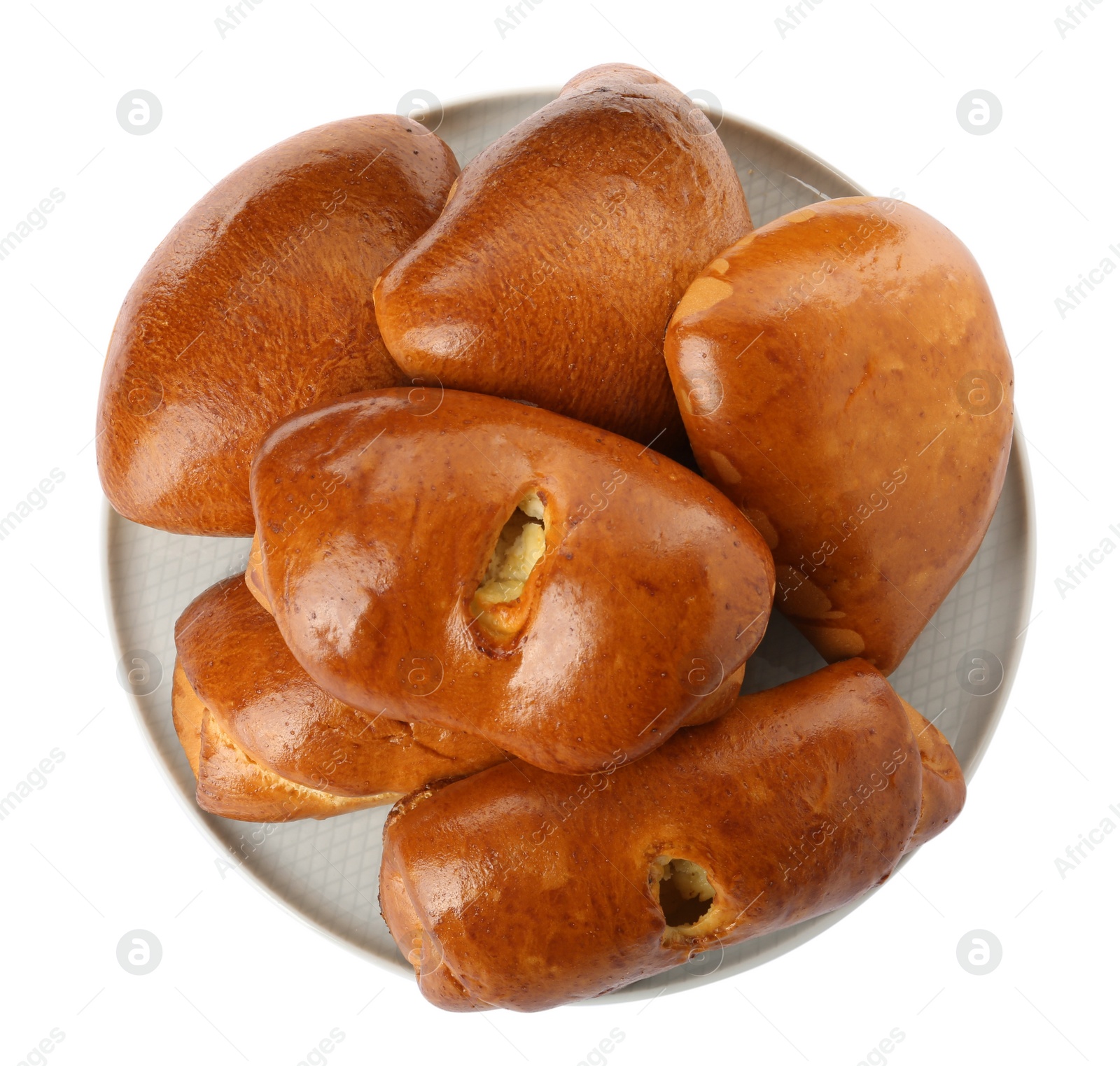 Photo of Plate with delicious baked patties on white background, top view