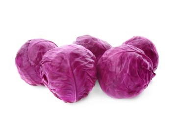 Whole ripe red cabbages on white background