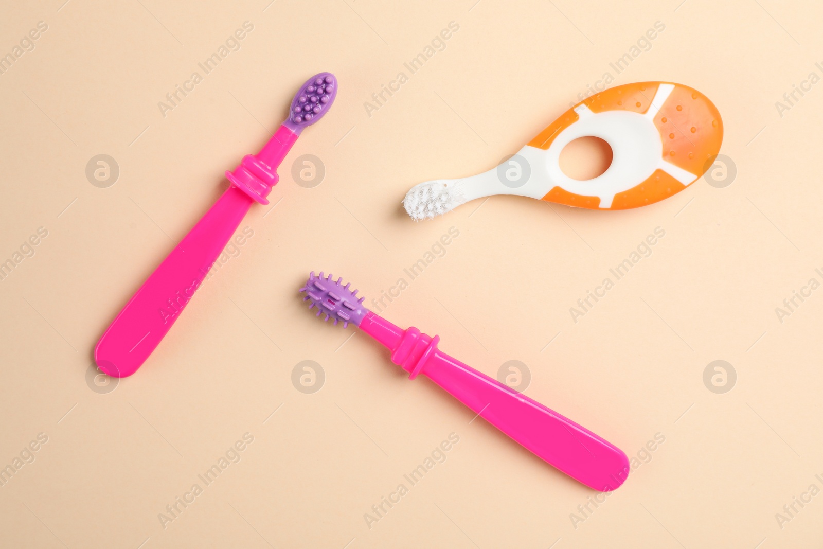 Photo of Manual toothbrushes for children on color background, top view