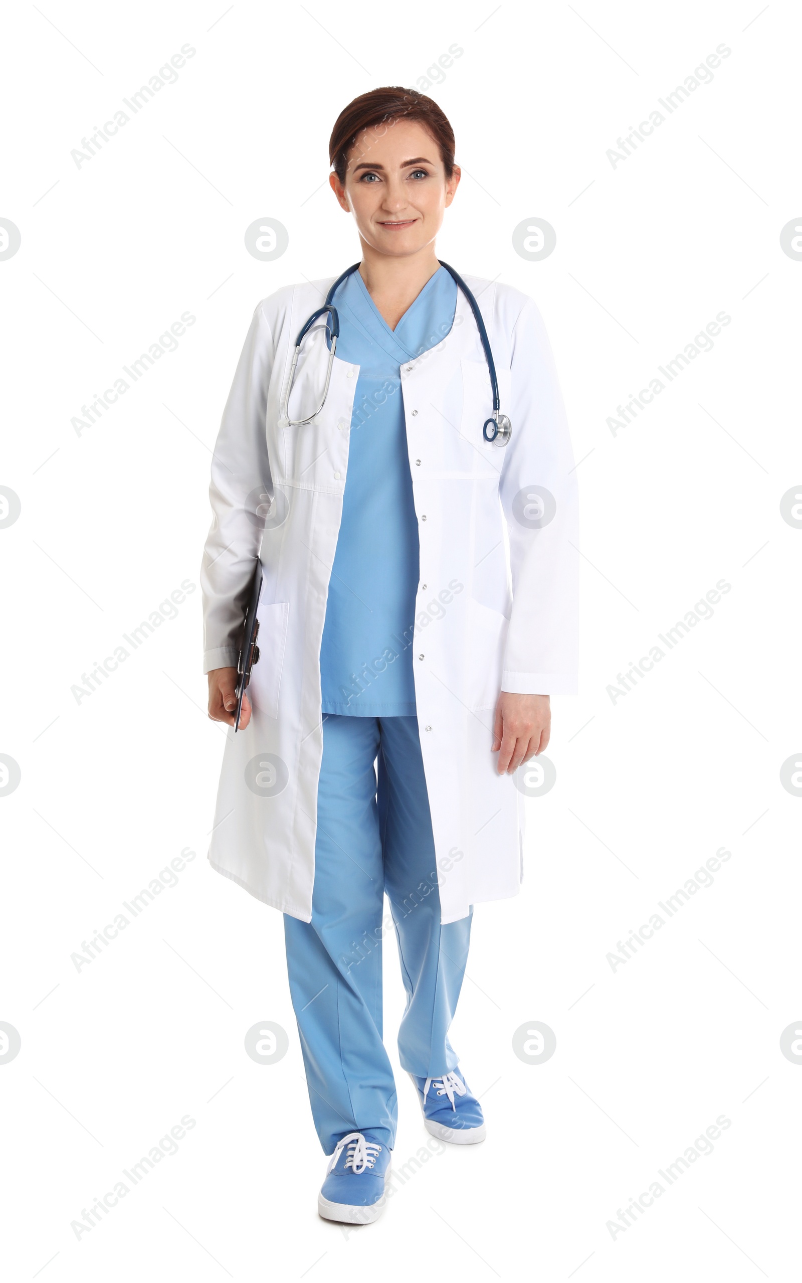 Photo of Full length portrait of female doctor with clipboard isolated on white. Medical staff