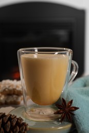 Photo of Tasty eggnog and anise star on white table