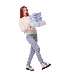 Photo of Young woman in sweater with Christmas gifts on white background
