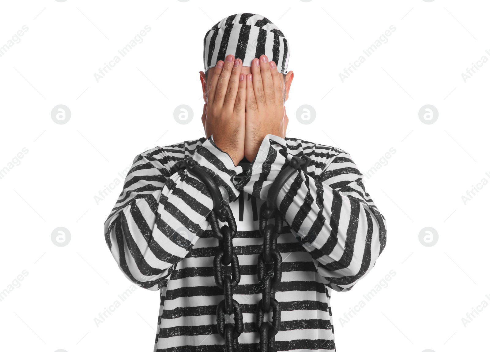 Photo of Prisoner in special uniform with chained hands on white background