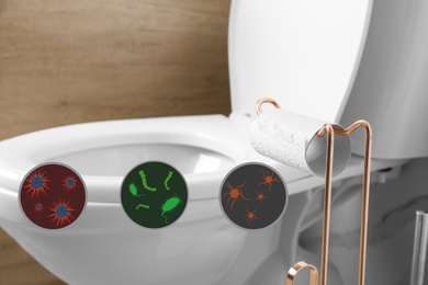 Illustrations of microbes on toilet bowl in bathroom