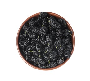 Delicious ripe black mulberries in bowl on white background, top view